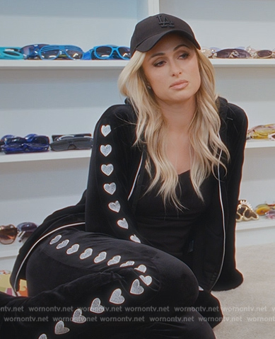 Paris's black heart embroidered hoodie and track pants on Paris in Love