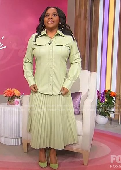 Sherri's green leather shirt and pleated skirt on Sherri