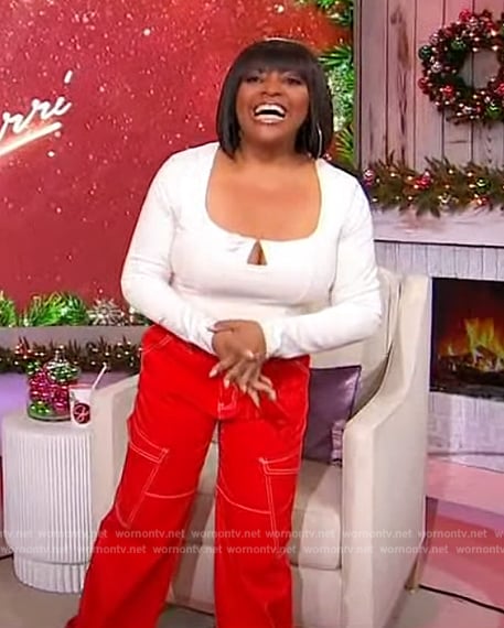 Sherri's white square neck top and red pants on Sherri