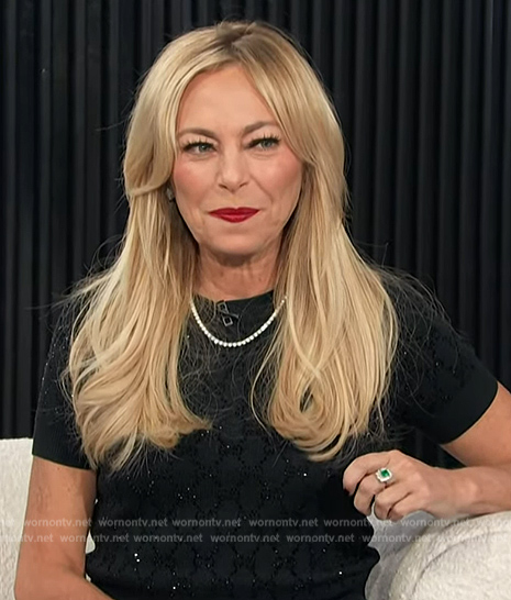 Sutton Stracke's black GG embellished short sleeve sweater on E! News
