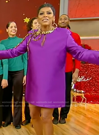 Tamron's purple bow embellished mini dress on Tamron Hall Show
