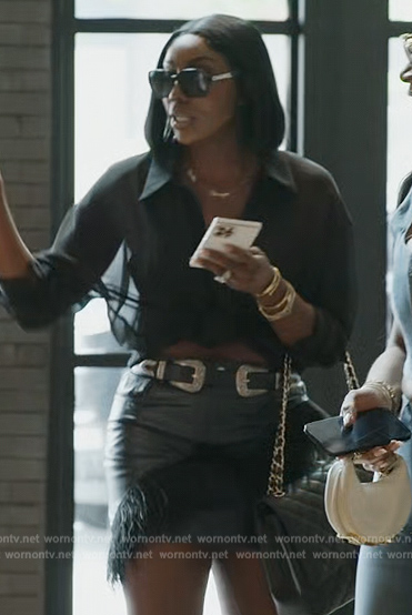 Wendy's black leather feather trim mini skirt on The Real Housewives of Potomac