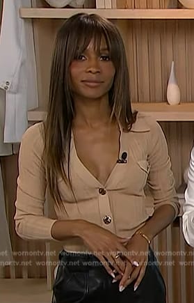 Zuri's beige cardigan on Access Hollywood