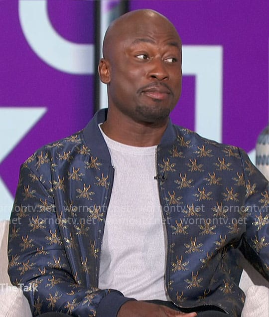 Akbar's blue bug print bomber jacket on The Talk