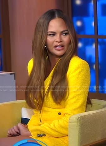 Chrissy Teigen's yellow cropped blazer and mini skirt on Good Morning America