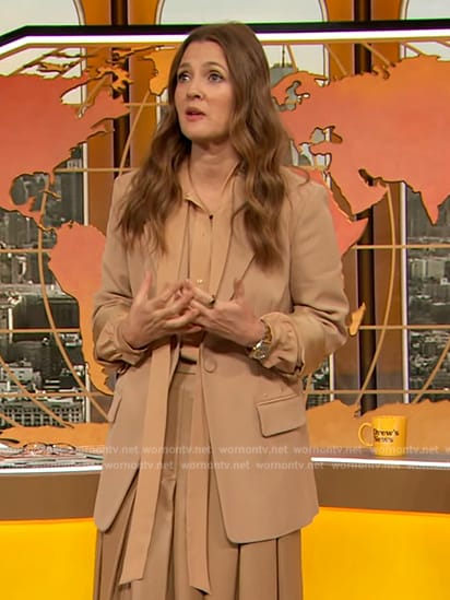 Drew's beige tie neck blouse and blazer on The Drew Barrymore Show