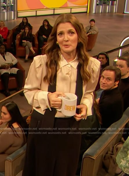 Drew's white contrast tie neck blouse on The Drew Barrymore Show