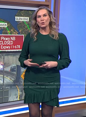 Emily West's green long sleeve ruffle dress