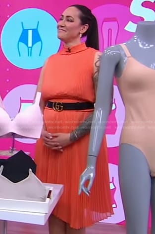 Jene' Luciani's orange pleated dress and belt on Good Morning America
