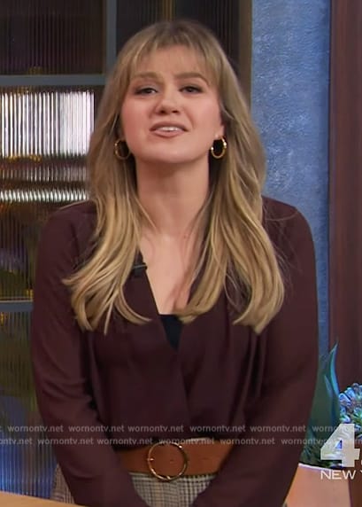 Kelly's burgundy wrap blouse and plaid skirt on The Kelly Clarkson Show
