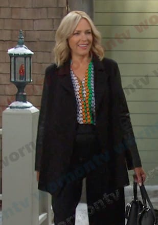 Nicole's heart print blouse and black jacket on Days of our Lives