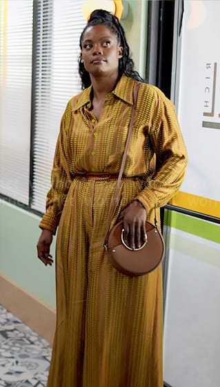 Sabrina's brown printed shirt and pants set with circle bag on Tyler Perrys Sistas