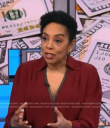 Sharon Epperson's red embellished v-neck blouse on NBC News Daily
