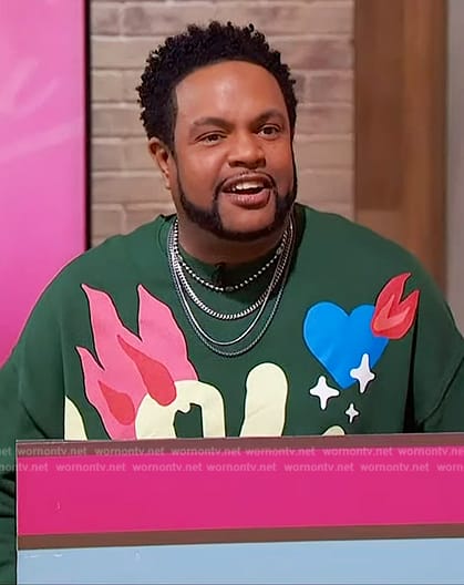 Jawn's green love graphic sweatshirt on Sherri