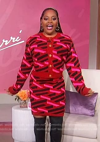 Sherri's red geometric print cardigan and mini skirt on Sherri