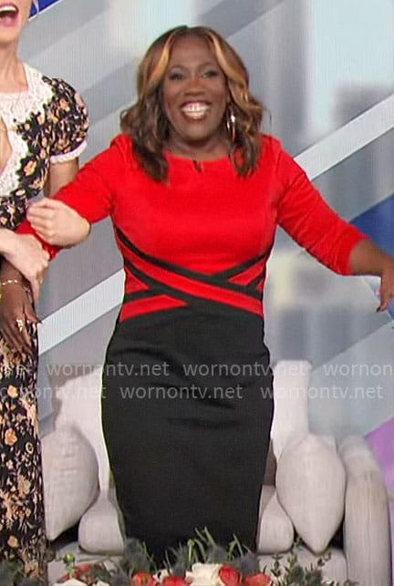 Sheryl's red and black criss cross dress on The Talk