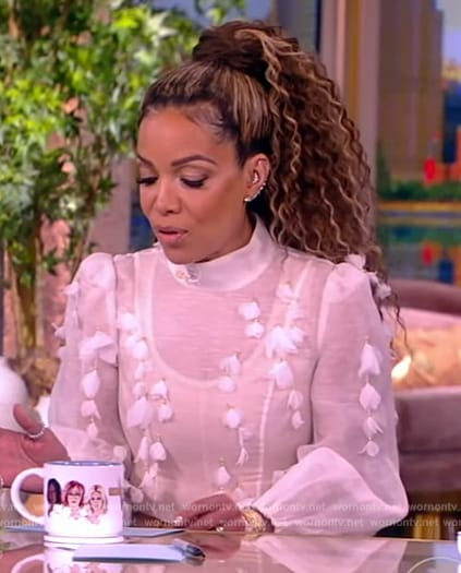 Sunny's beige pants and white floral top on The View