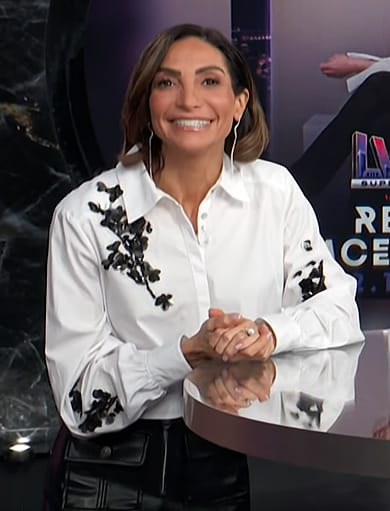 Courtney Lopez's white floral embellished blouse on E! News