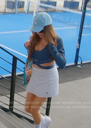 Adriana's teal cross strap top on The Real Housewives of Miami