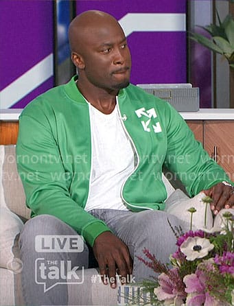 Akbar's green jacket and sneakers on The Talk