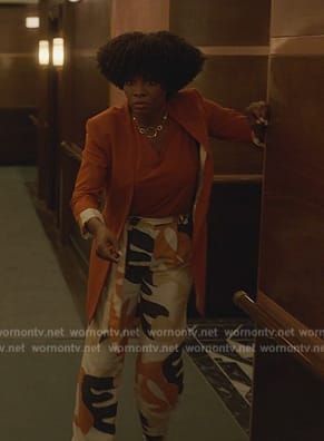Alexandra's orange blazer and printed pants on Death and Other Details