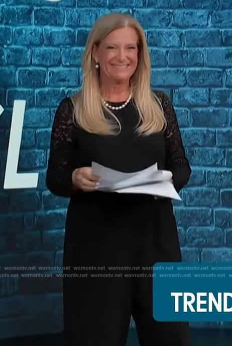 Alison Triessl's black lace sleeve jumpsuit on Access Hollywood