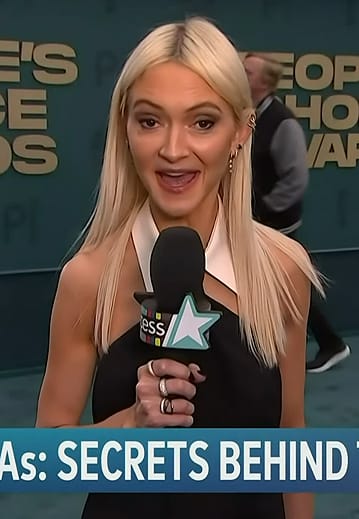 Zanna Roberts' black sleeveless mini dress on Access Hollywood