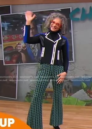 Carla Hall's black colorblock moto jacket and green geometric pants on Good Morning America