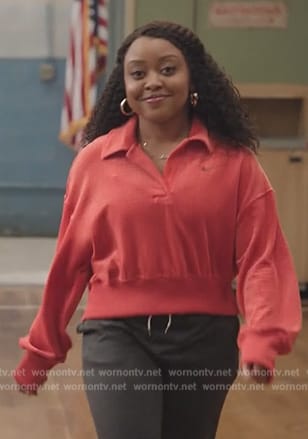 Janine's red velour polo sweater on Abbott Elementary