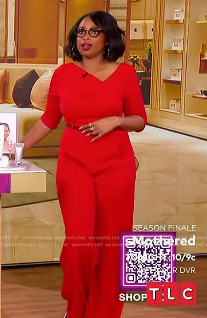 Jennifer's red asymmetric neck jumpsuit on The Jennifer Hudson Show
