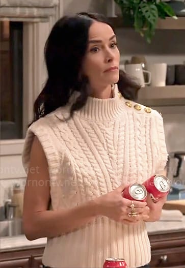 Julia's white cable knit sweater vest on Extended Family
