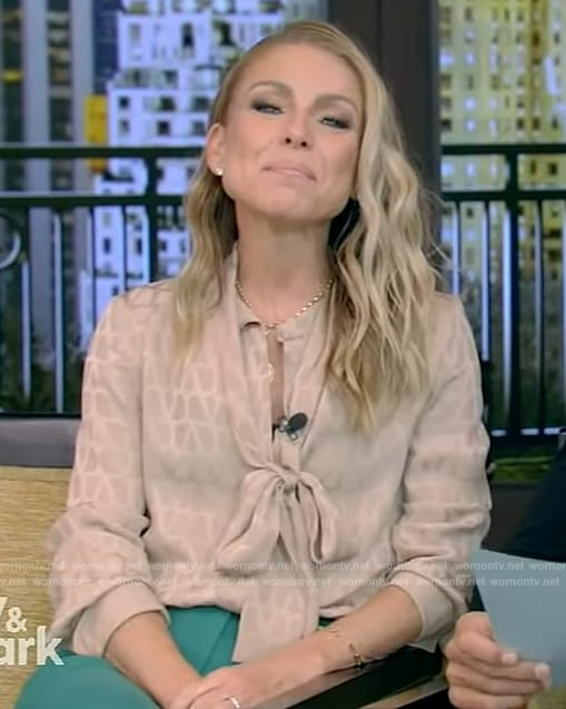 Kelly's beige printed tie neck blouse on Live with Kelly and Mark
