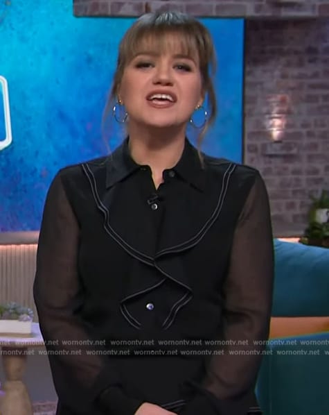 Kelly's black ruffle blouse and draped skirt on The Kelly Clarkson Show
