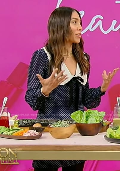 Nicole Berrie's navy polka dot print dress on Tamron Hall Show