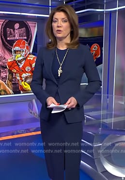 Norah's navy blazer and skirt on CBS Evening News