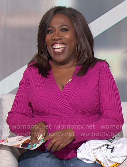 Sheryl's pink rib knit v-neck sweater on The Talk