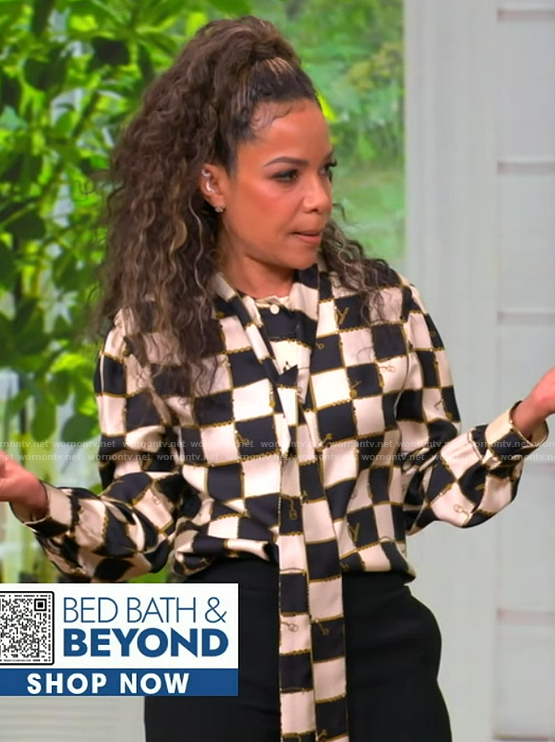 Sunny's checkerboard print tie neck blouse on The View