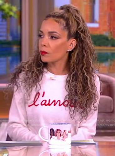 Sunny's white l'amour print sweater on The View