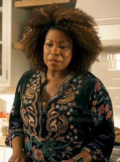 Vi's floral and embroidered velvet dress on The Equalizer