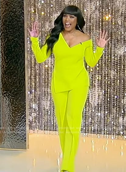 Angela Bassett's neon asymmetric top and pants on Tamron Hall Show