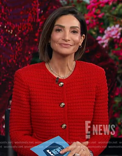 Courtney's red knit cardigan on E! News