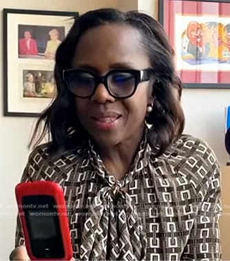 Deborah's brown printed tie neck dress on Good Morning America