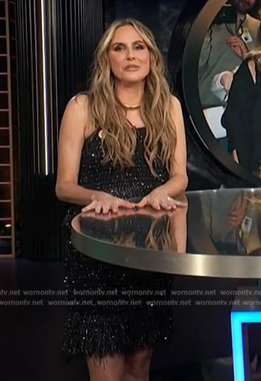 Keltie's black tweed fringe top and skirt by E! News