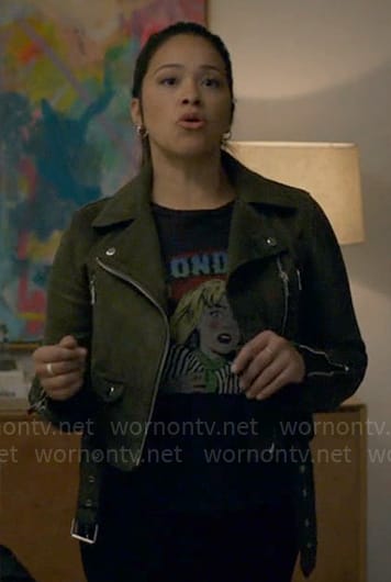 Nell's MONDAY graphic tee and green suede moto jacket on Not Dead Yet