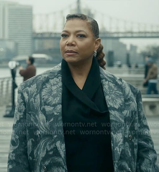 Robyn's grey floral coat and black sweatshirt on The Equalizer