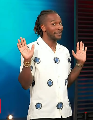 Scott's white printed shirt on Access Hollywood