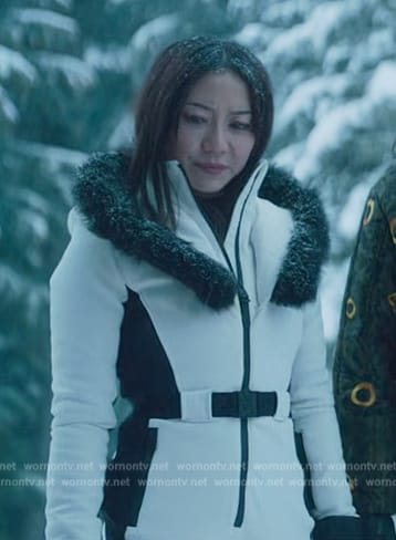 Teddy's white contrast trim ski jumpsuit on Death and Other Details