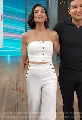 Courtney's white button vest and pants on Access Hollywood