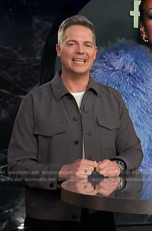 Jason's gray button front shirt on E! News