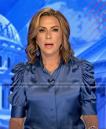 Kyra Phillips's blue puff sleeve satin blouse on Good Morning America